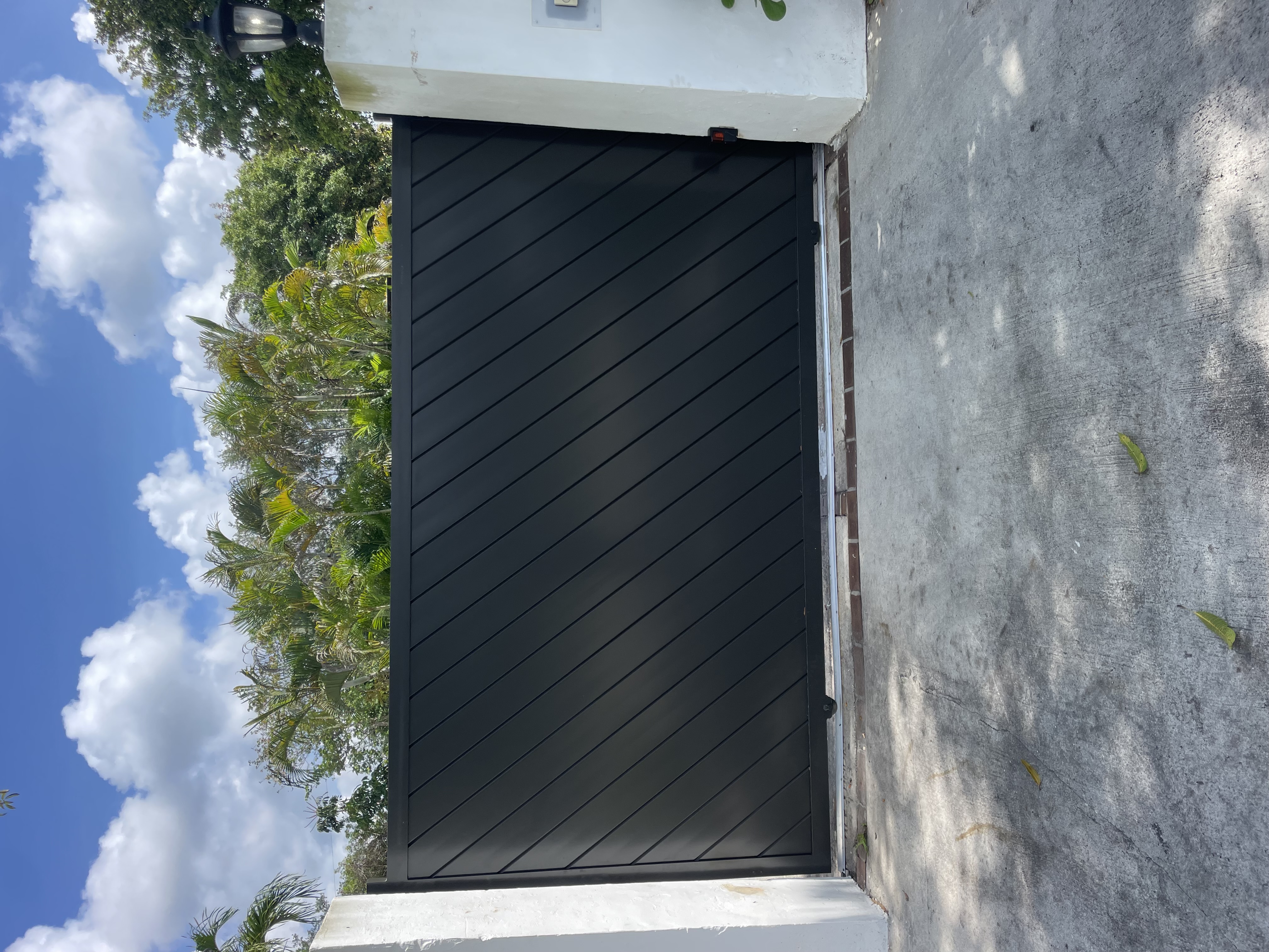 Black Diagonal Slat Privacy Gate
